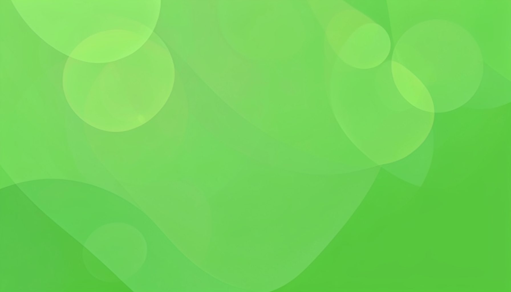 Soft green abstract background with subtle lens-flare circles and gentle gradient shapes